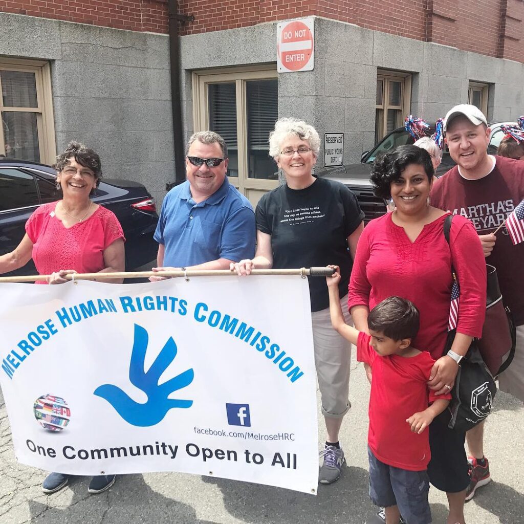 Manisha and her son, pictured here with fellow Melrose Human Rights Commissioners in 2017 before the Memorial Day Parade in Melrose, MA