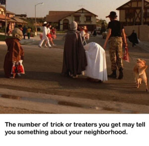 Photo from the movie E.T. featuring lots of kids trick or treating -- including a kid dressed up as Yoda!